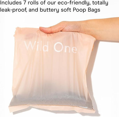 Wild One Dog Poop Bag Holder and Dispenser with Leash Attachment, Leak Proof, Easy Twist Top for Refills, Includes 1 Box Of Bags, Lilac