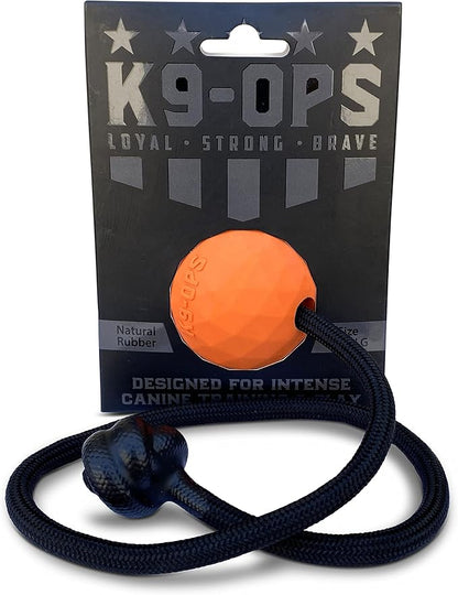 K9 Ops Dog Ball on a Rope Moki Tug Toy - Solid Rubber Fetch Training Reward - Large Dogs Tugs Durable Aggressive Chewers (Tiger Orange, LG/XL)